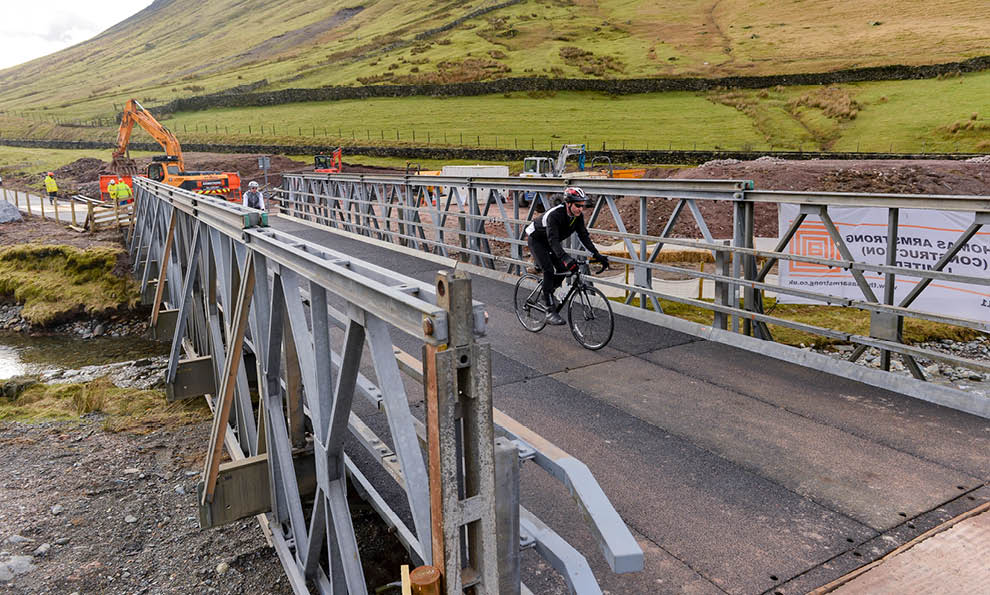 Cyclist on bridge at Thirlmere